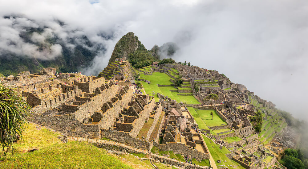 ruins machu picchu clouds sacred valley inca peru south america Andean Explorers Cusco